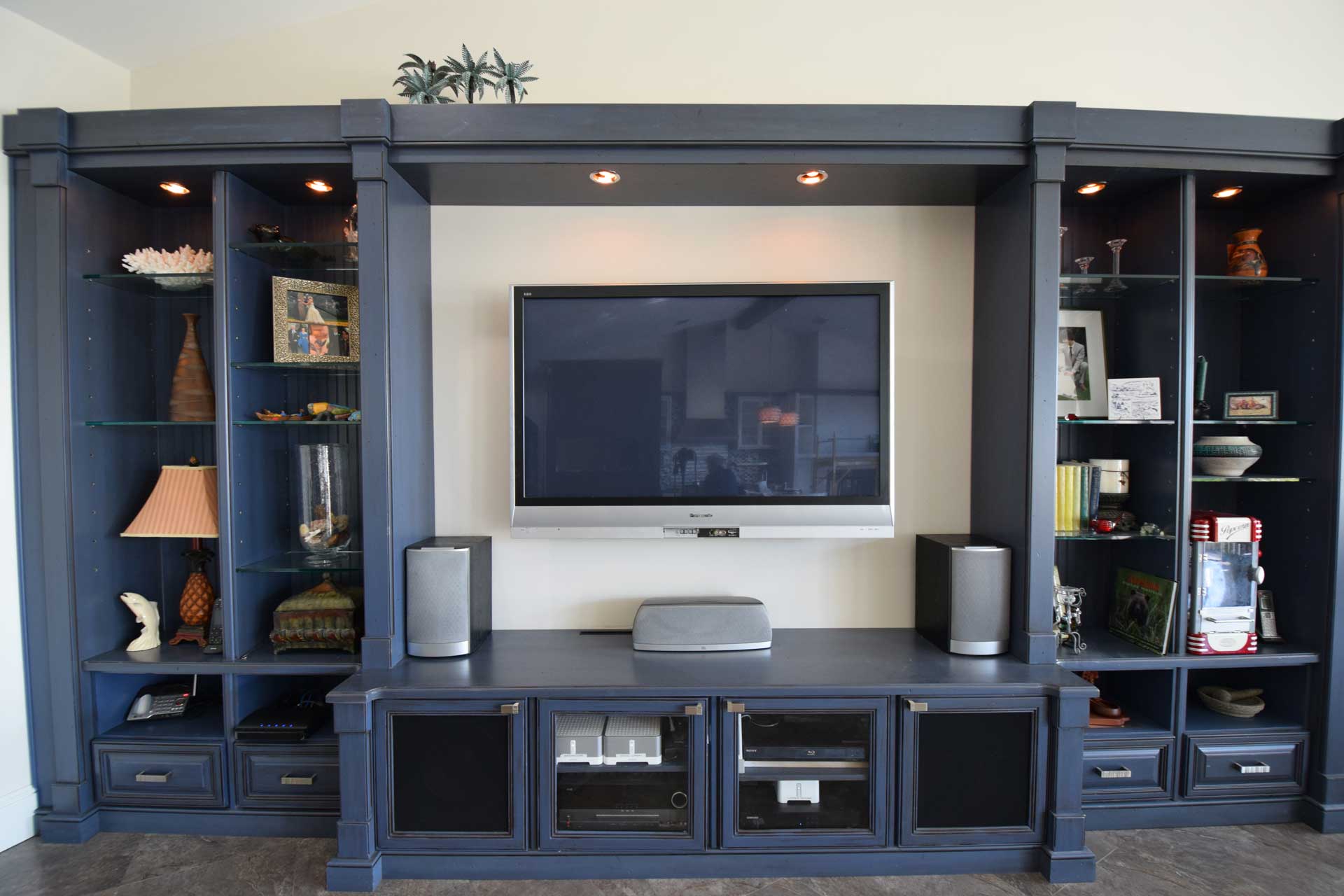 A media room with custom storage.