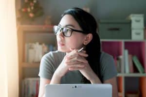 Woman at home office desk